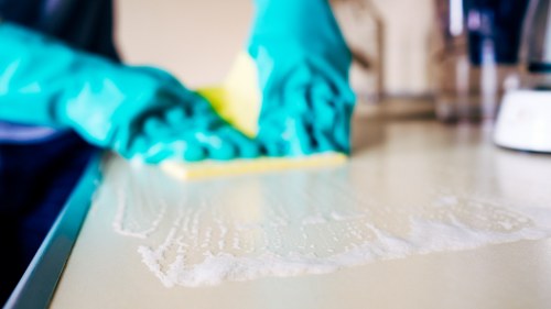 Eco-friendly upholstery cleaning equipment in use